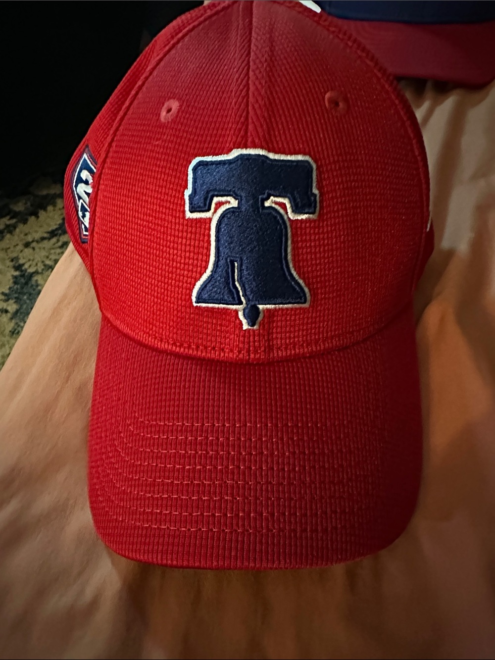 New Era Red Baseball Cap with Blue Liberty Bell Patch